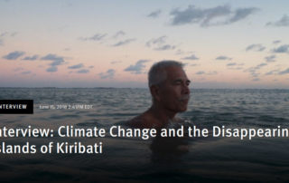 Anote Tong, then president of Kiribati, swims in the lagoon near his home