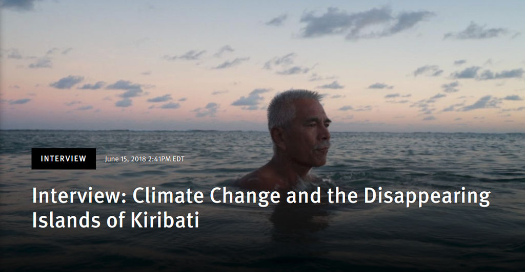 Anote Tong, then president of Kiribati, swims in the lagoon near his home