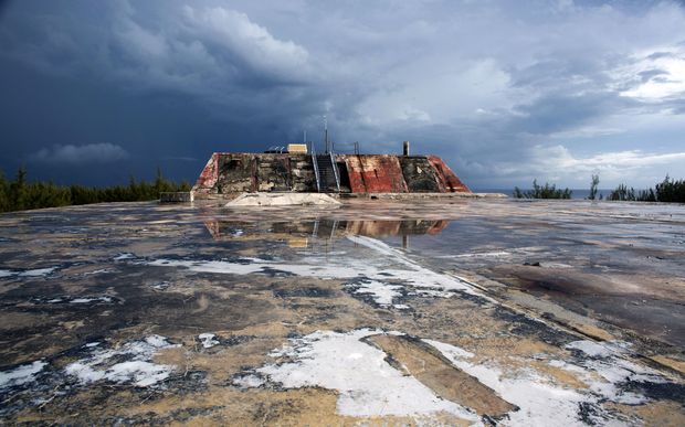 eight_col_mururoa_grim 50 years after the first nuclear test, and 20 years after the last. The French Polynesia atoll of Mururoa is still largely a no-go zone. Photo: AFP